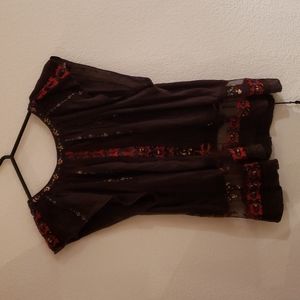 Cropped washed black beaded top.